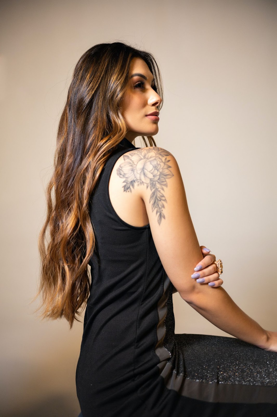 Woman with a Tattoo on the Shoulder 